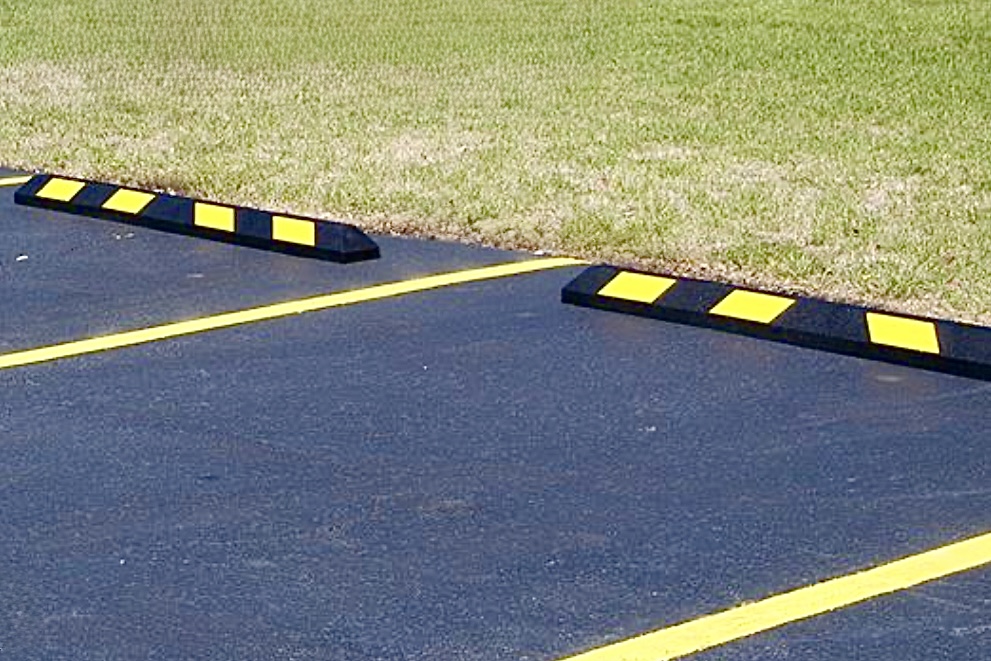 Speed bump wheel stop parking block installation Iowa City